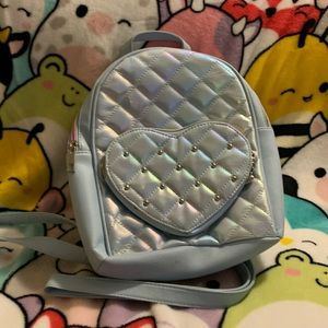 OMG Accessories mini backpack with call outs